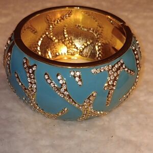 Elegant Gold and Blue Bracelet